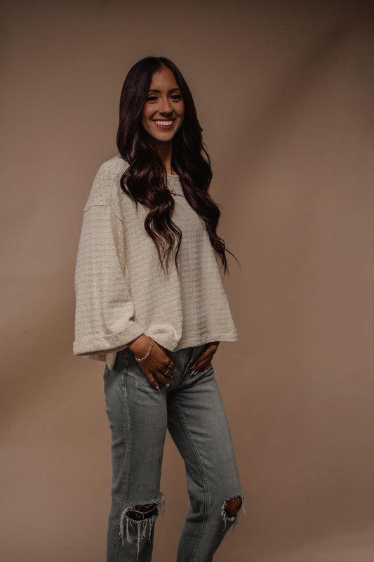 cream wide sleeve knit top